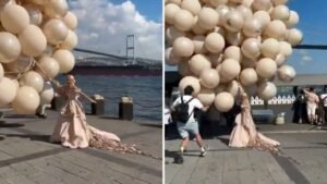 novia arrastrada globos