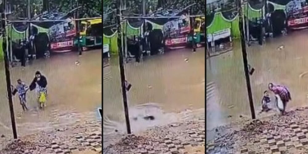 Abuela nieta zanja inundación India