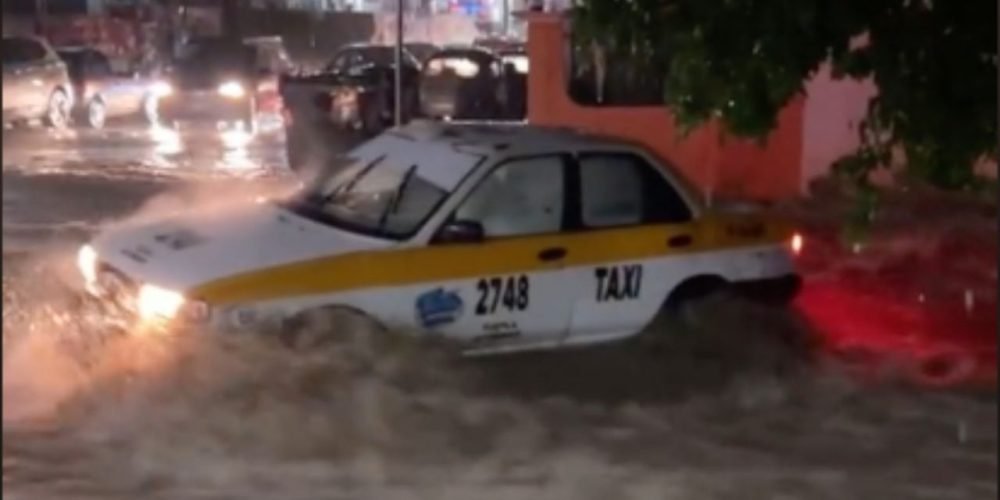taxista-arrastrado-corriente-junio-2024